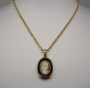 pendente-cammeo-montato-su-onice-e-oro-giallo